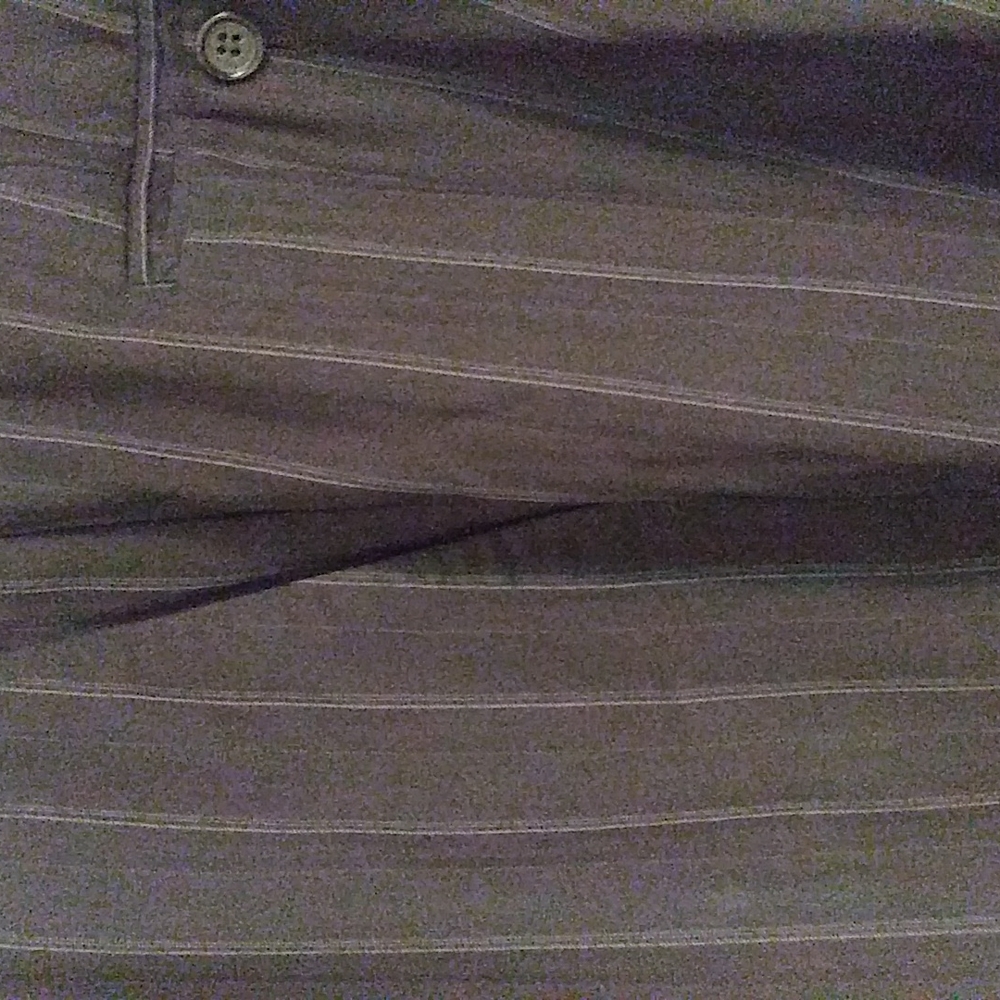 Black and blue polyester 2 pockets no pleats and made with fine Italian material